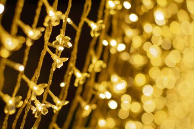 Arka planda Işıltılı bokeh ışıklı led ışıklar dekorasyon kutlama olay grup üzerinde seçici odak