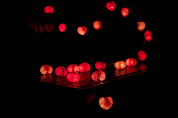 Closeup Heart Shape Led Lights Line Puts Wooden Table Decorated — Stock Photo, Image