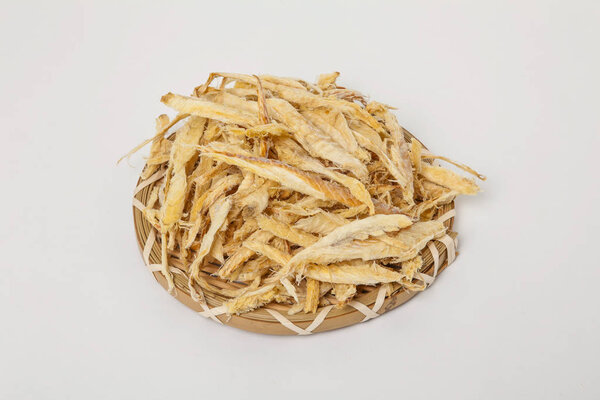 Dried shredded pollack on a white background