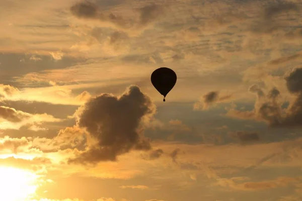 Balloons fly in the evening