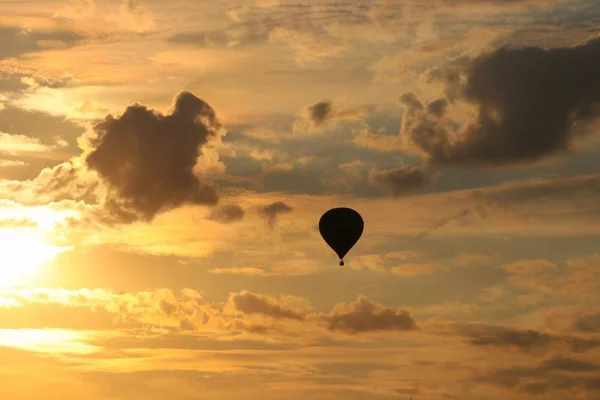 Balloons fly in the evening