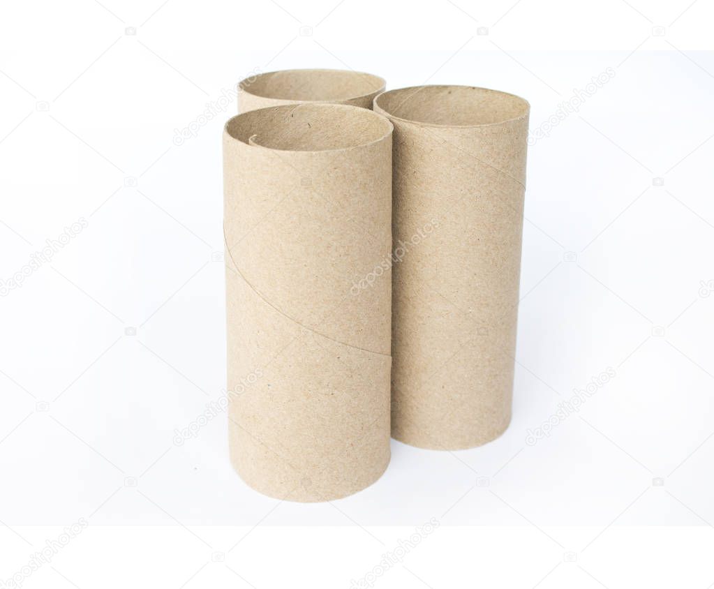 Brown paper rolls on white background