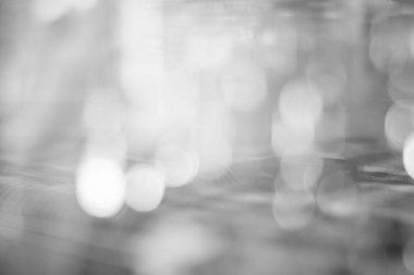 Bokeh soyut arkaplanı ile bulanık gri.