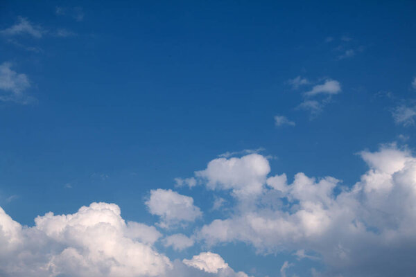 White clouds with Blue sky background.