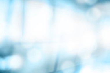 Bokeh soyut arkaplan ile mavi bulanıklaştırılmış.