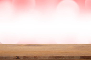 Bulanık ışık kırmızı gradyan bokeh soyut arkaplan ile boş masa.