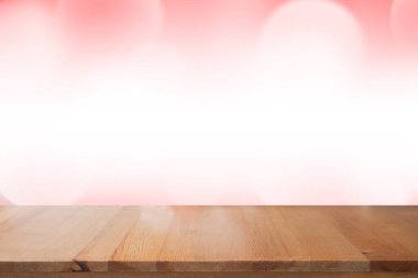 Bulanık ışık kırmızı gradyan bokeh soyut arkaplan ile boş masa.