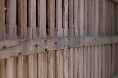 Arka plan için Eski Ahşap duvar dokusunun yumuşak odak noktası, klasik doku biçimi.