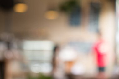 Soyut arkaplan için kahve dükkanını bulanıklaştırmış..