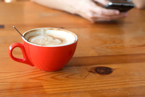 Woman enjoying warming drink, Late coffee in a cup.