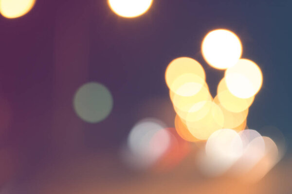 Blurred light on road in city with bokeh abstract background.