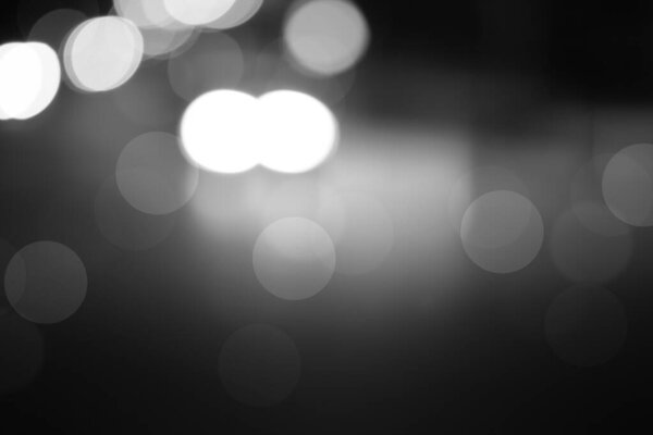 Blurred light gray gradient bokeh abstract background.