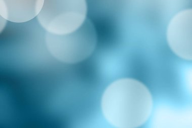Arkaplan için mavi bulanık bokeh özeti.