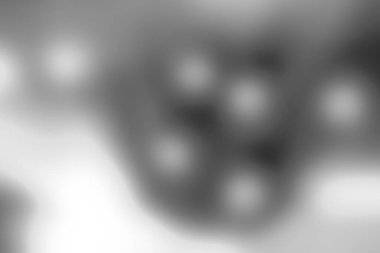 Bulanık açık gri gradyan bokeh soyut arkaplan.