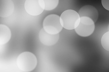 Gri bokeh arkaplan için soyut bulanıklaştırıldı.
