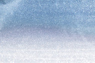 Gümüş folyo efekti bulanıklığı soyut arkaplan için birçok bokeh oluşturur.