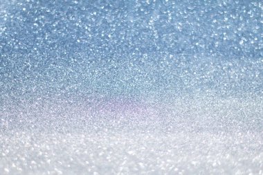 Gümüş folyo efekti bulanıklığı soyut arkaplan için birçok bokeh oluşturur.