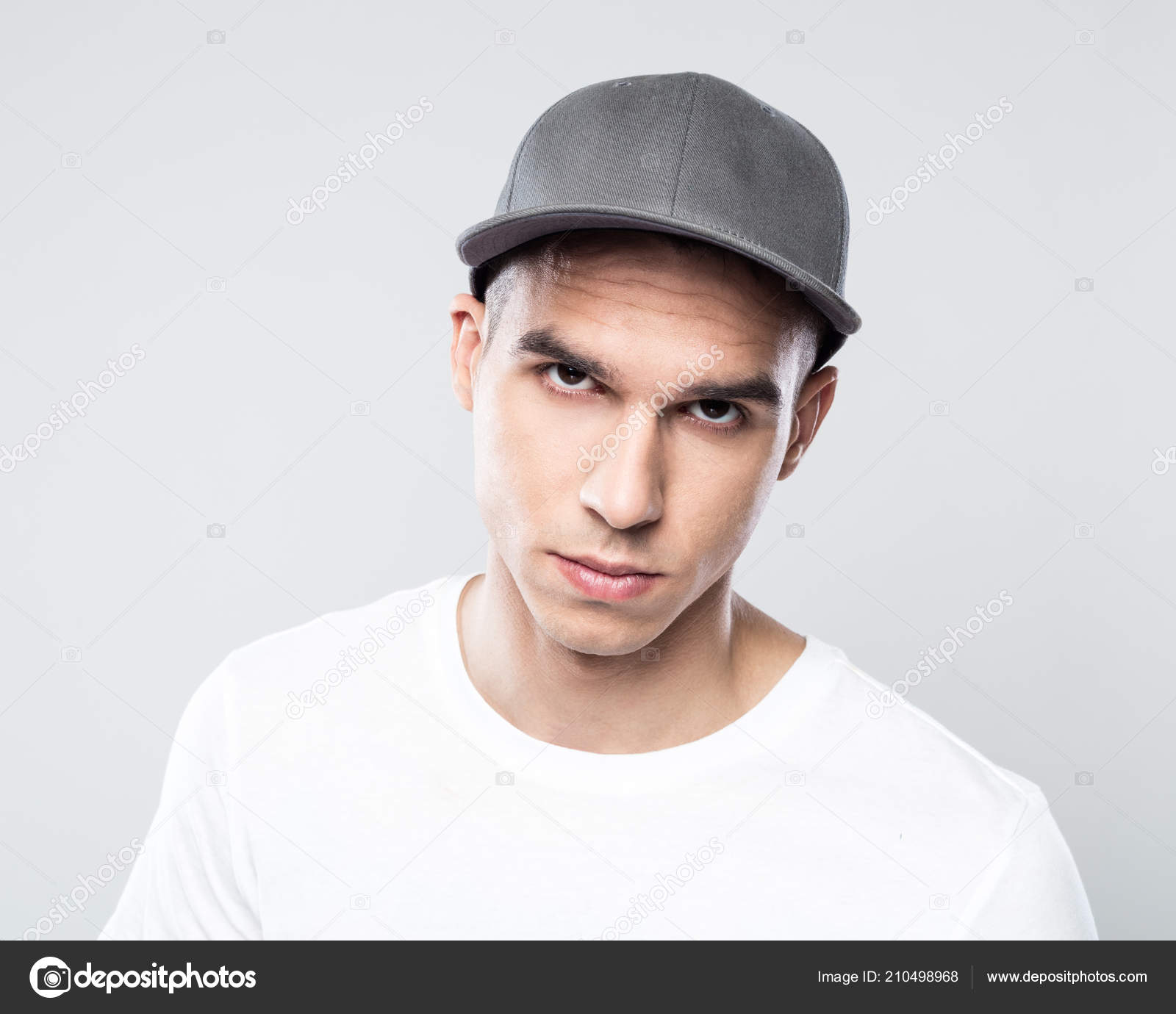 men wearing baseball caps