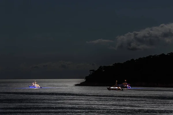 Boats by the night in Dubrovnik waters — Stock Photo, Image