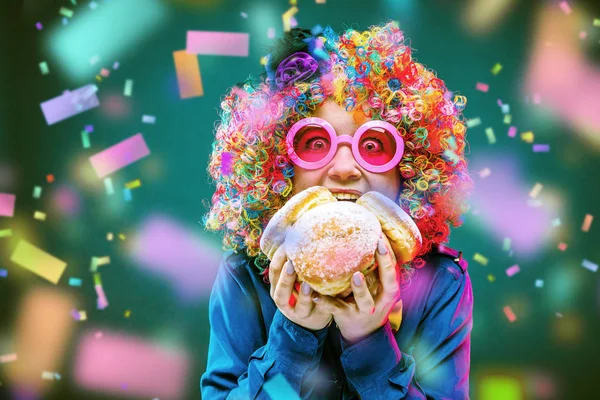 happy woman wearing color wig with party items