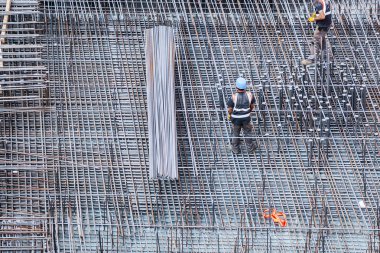 construction side with workers, view from above clipart