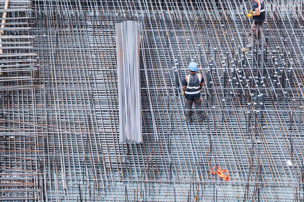 construction side with workers, view from above