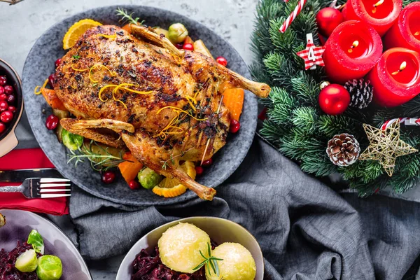 Christmas roast duck on festive table