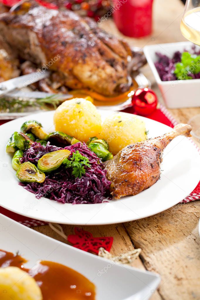 Christmas roast duck on festive table