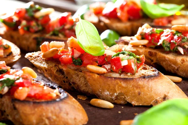 Bruschetta Slices Toasted Baguette Garnished Basil — Stock Photo, Image