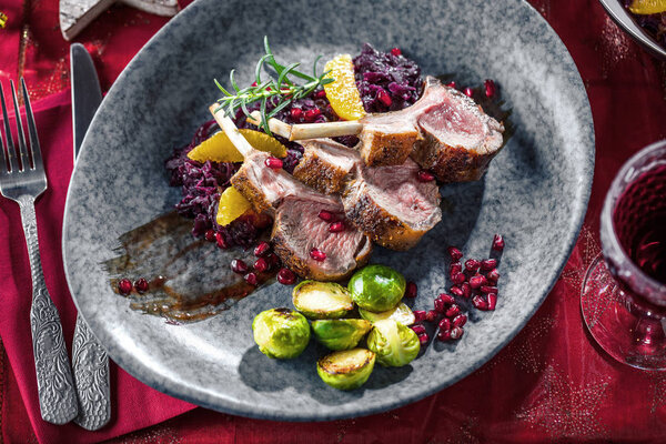 Roasted lamb ribs on table