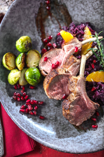 Roasted lamb ribs on table