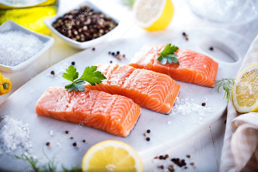 fresh raw salmon fillet with aromatic herbs  spices