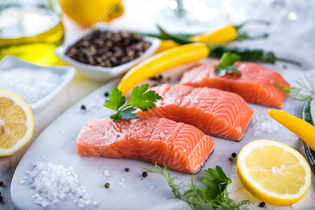 fresh raw salmon fillet with aromatic herbs  spices