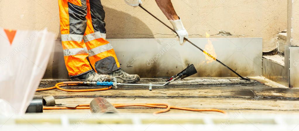 Workers on a road construction, industry and teamwork