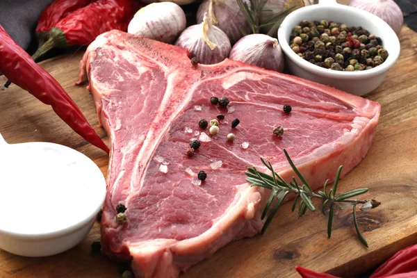 Bone Steak Seasoned Spices Fresh Herbs Served Wooden Board — Stock Photo, Image
