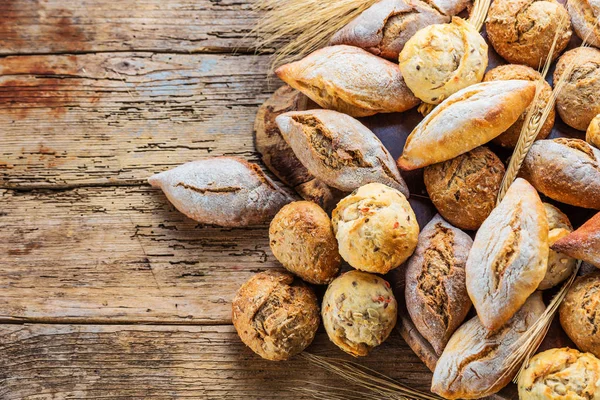 Different Kinds Fresh Bread Wooden Table Isolated Assortment Bread Brown — Stock Photo, Image