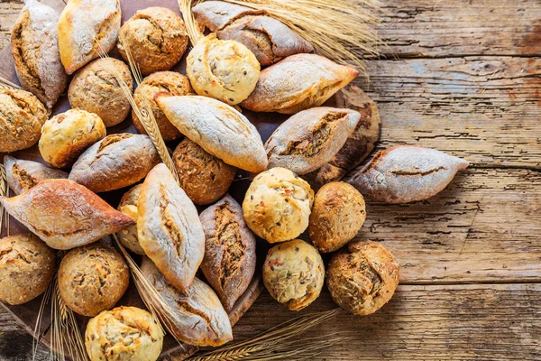 Different Kinds Fresh Bread Wooden Table Isolated Assortment Bread Brown — Stock Photo, Image