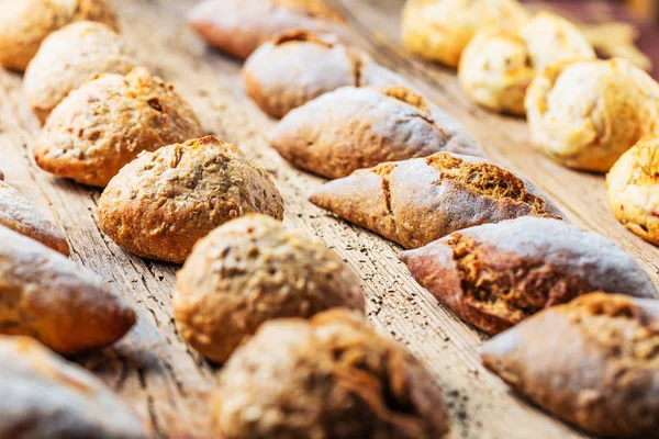 Different Kinds Fresh Bread Wooden Table Isolated Assortment Bread Brown — Stock Photo, Image