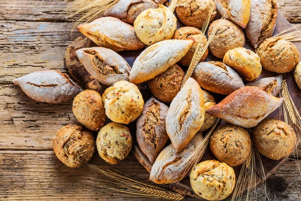 Different Kinds Fresh Bread Wooden Table Isolated Assortment Bread Brown — Stock Photo, Image