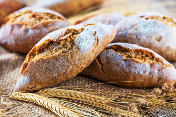 Different Kinds Fresh Bread Wooden Table Isolated Assortment Bread Brown — Stock Photo, Image