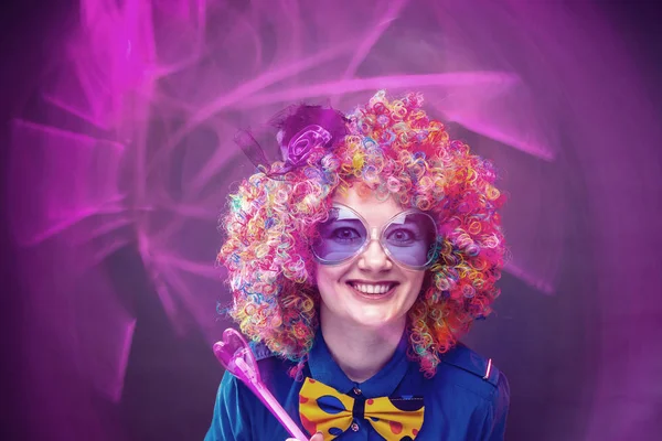 Portrait of beautiful party woman in wig and  glasses (Carneval)