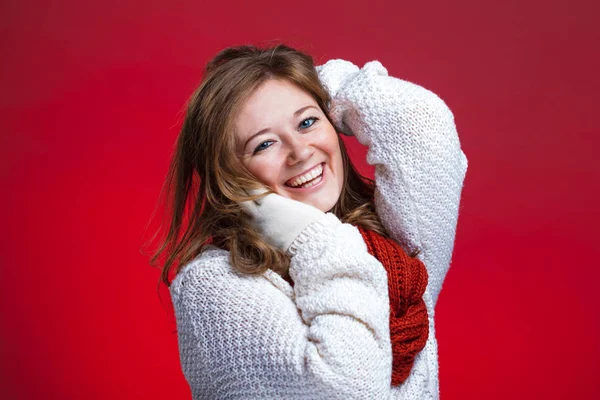 christmas smiling woman in sweater and Gloves