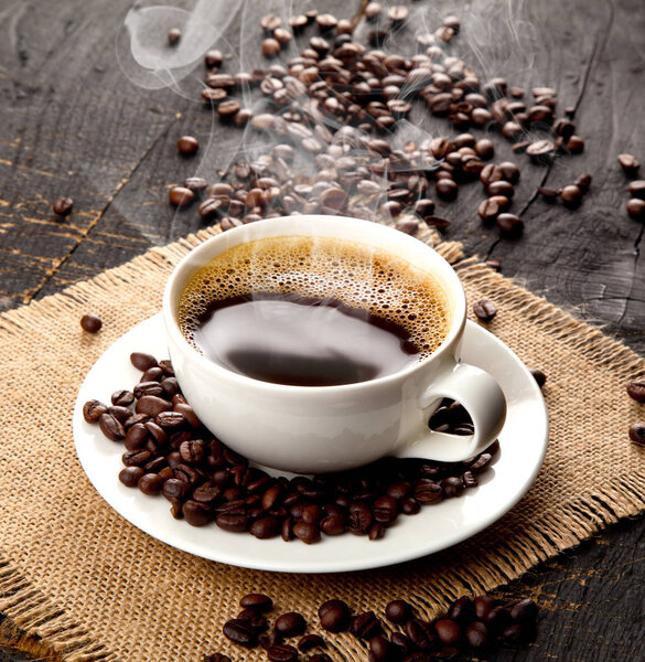 Cup of hot coffee drink with coffee beam's