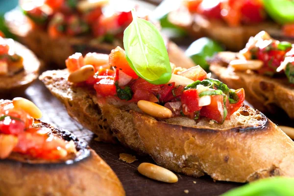 Bruschetta Slices Toasted Baguette Garnished Basil — Stock Photo, Image