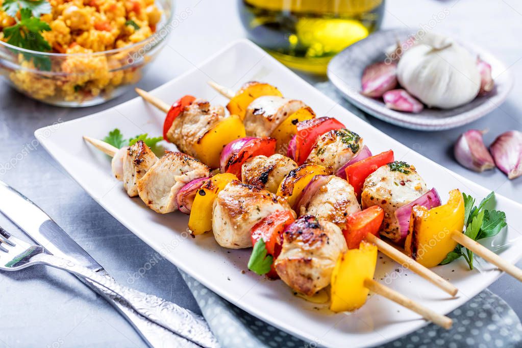 Grilled skewers of vegetables and meat on the Table 