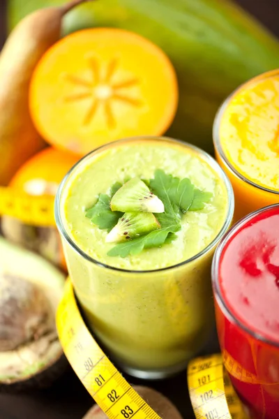 Colorful smoothie, healthy detox vitamin diet or vegan food concept, fresh vitamins, breakfast drink