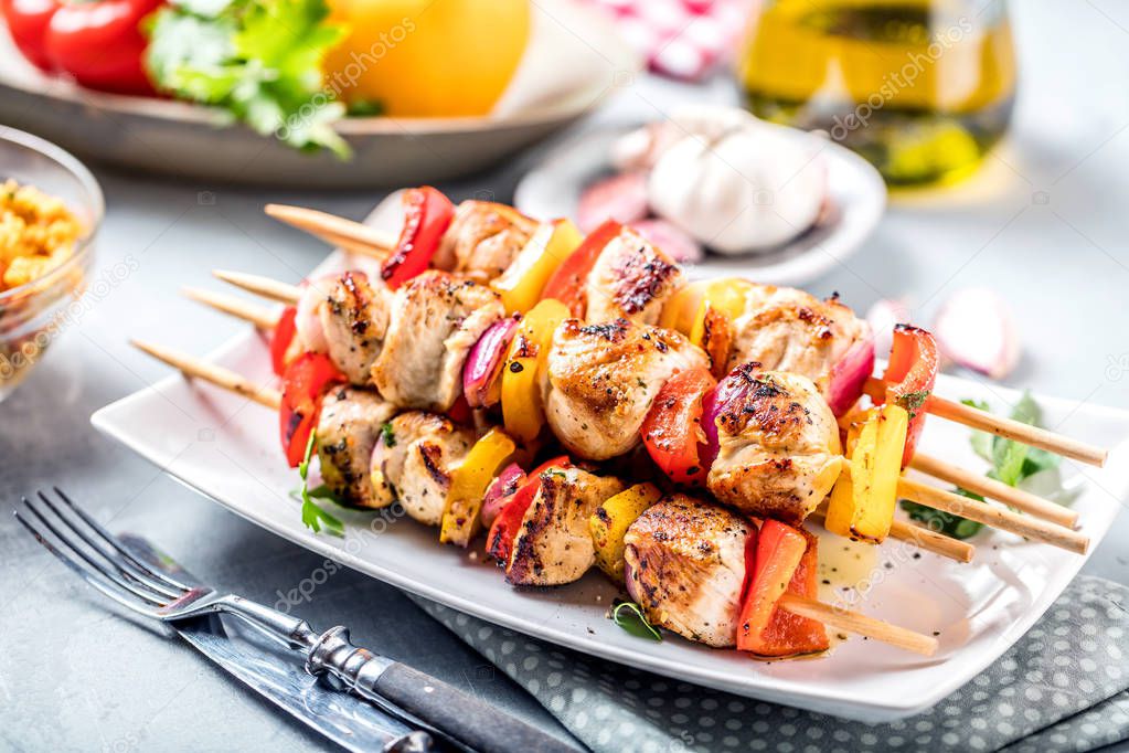 Grilled skewers of vegetables and meat on the Table 