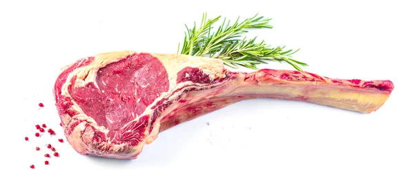 Steak Tomahawk Bersandar Pada Latar Belakang Putih Terbujuk — Stok Foto