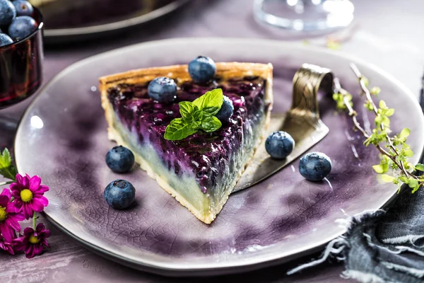 Sweet Cheese cakes with berries, mint and whipped cream. Top view