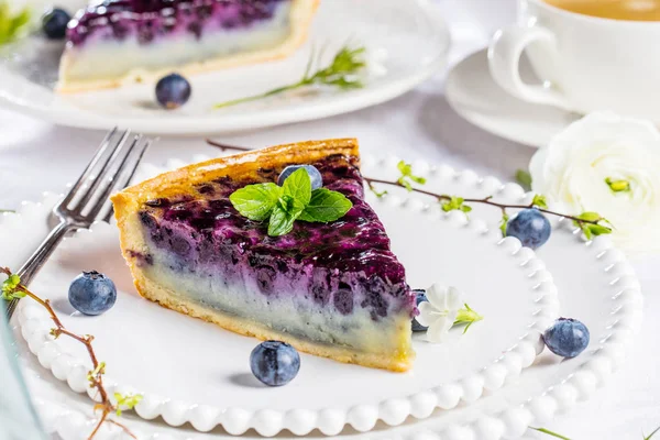 Sweet Cheese cakes with berries, mint and whipped cream. Top view